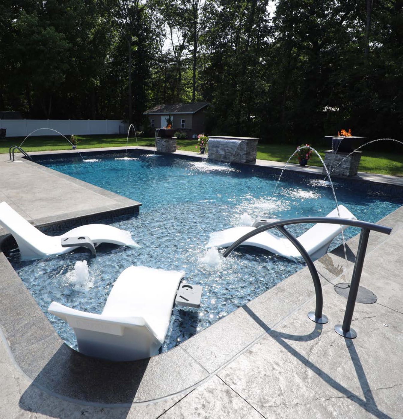 Sun ledge with in-pool loungers and deck jets