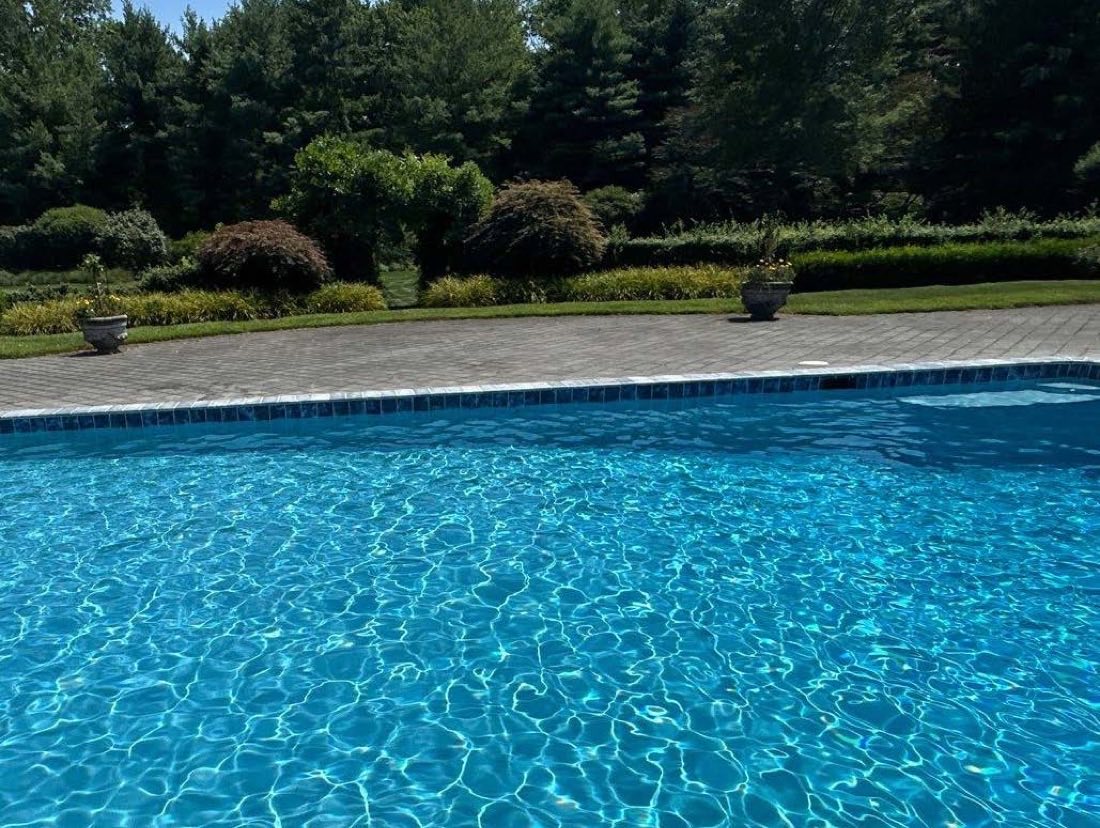 Clear blue pool after weekly maintenance